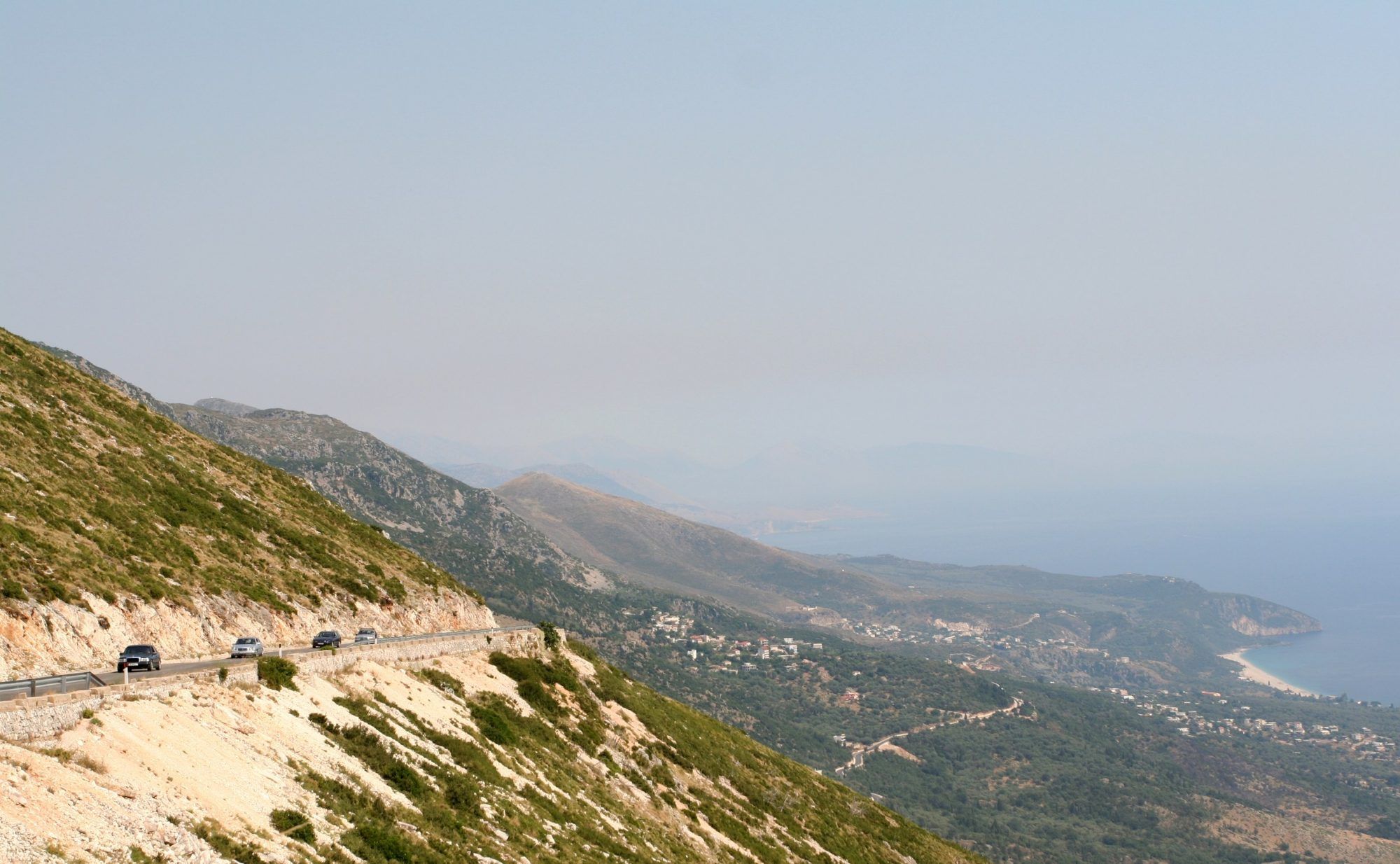 The coast road winding down from the Llogara pass